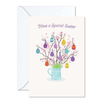 Easter card with colorful eggs on branches in a mug, 'Have a Special Easter' text.