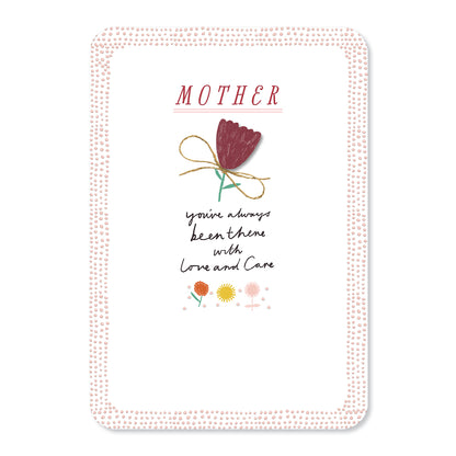 Hallmark Mother's Day Card - Love & Care featuring embossed flowers and a 3D plaque, expressing love for mother.