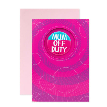 Hallmark Mother's Day Card With Badge - Mum Off Duty featuring pink and purple swirl design and detachable badge in a flat lay view.