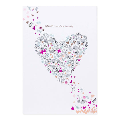 Hallmark Mother's Day Card - You're Lovely featuring a intricate floral heart design in pink and black, embellished with the message 'Mum, you're lovely'.