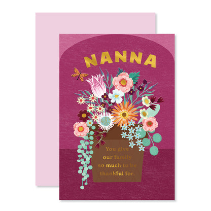 Hallmark Mother's Day Card For Nanna - So Thankful featuring vibrant floral illustration and embossed gold lettering on a pink background.