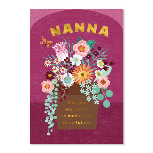 Hallmark Mother's Day Card For Nanna - So Thankful with vibrant flower illustrations and gold foil lettering, flat lay view.