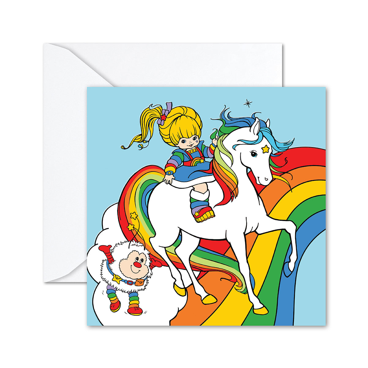 Hallmark Rainbow Brite Greeting Card featuring Rainbow Brite riding Starlite with Twink on a vibrant rainbow background, flat lay view.