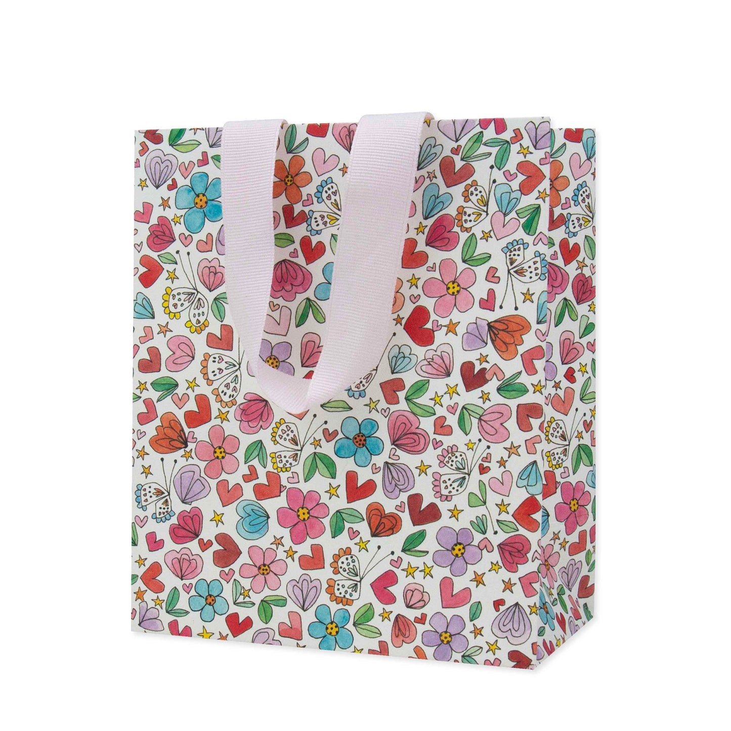 Hallmark x Love, Meredith Small Gift Bag - Butterflies, Hearts, Stars & Flowers with colourful floral and heart designs, showing light pink handles.