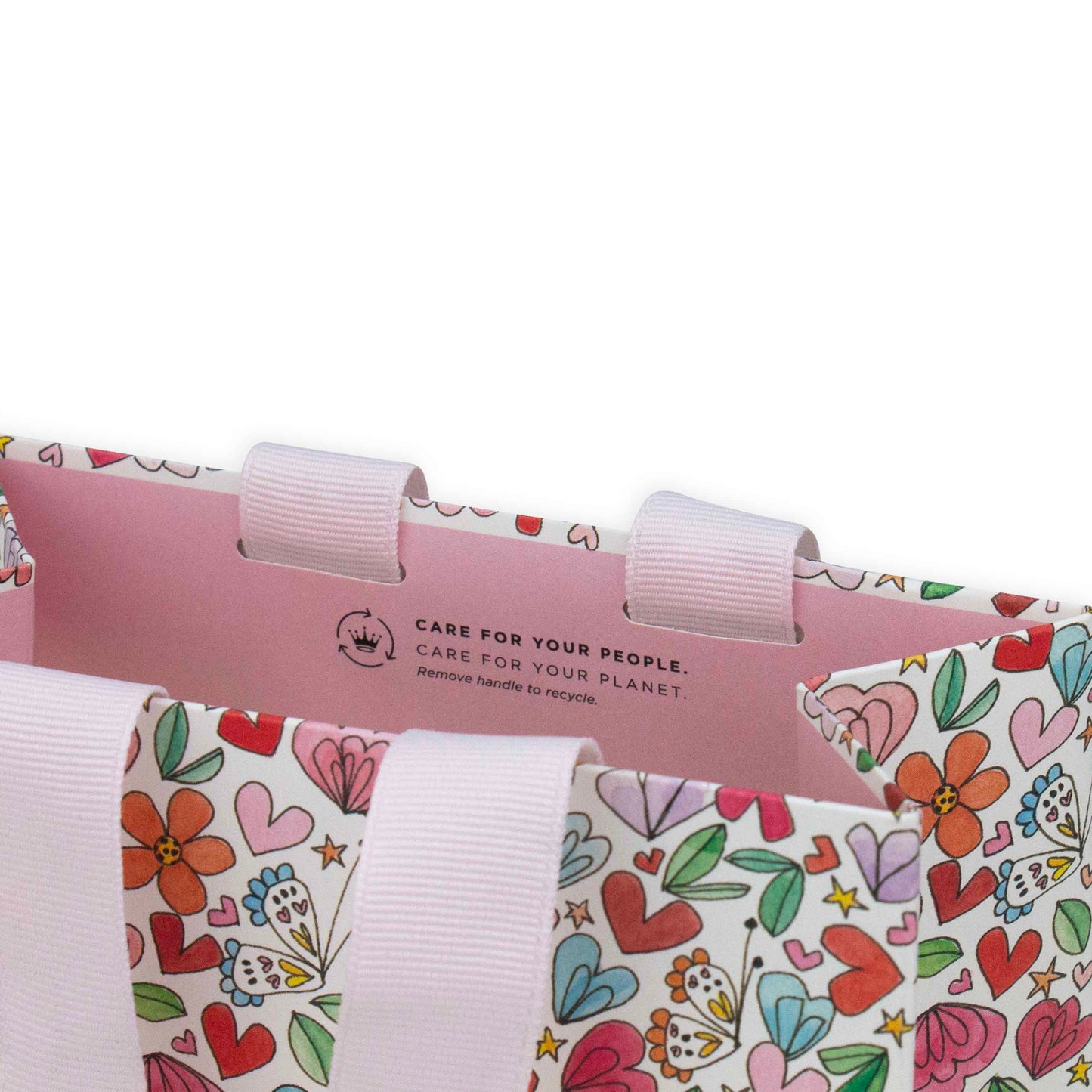 Hallmark x Love, Meredith Small Gift Bag - Butterflies, Hearts, Stars & Flowers, close up of handles and colourful interior design.