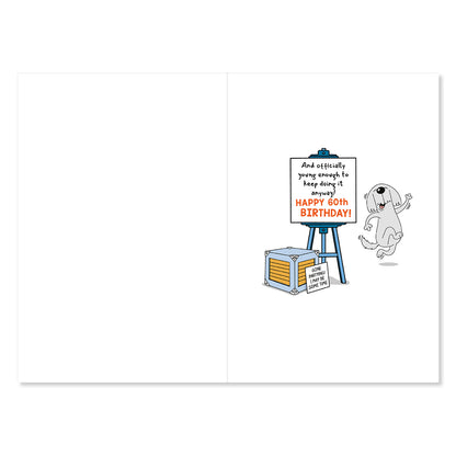 Hallmark 60th Birthday Card - Officially Old Enough, inside view featuring cartoon dog and birthday sign with colourful graphics.