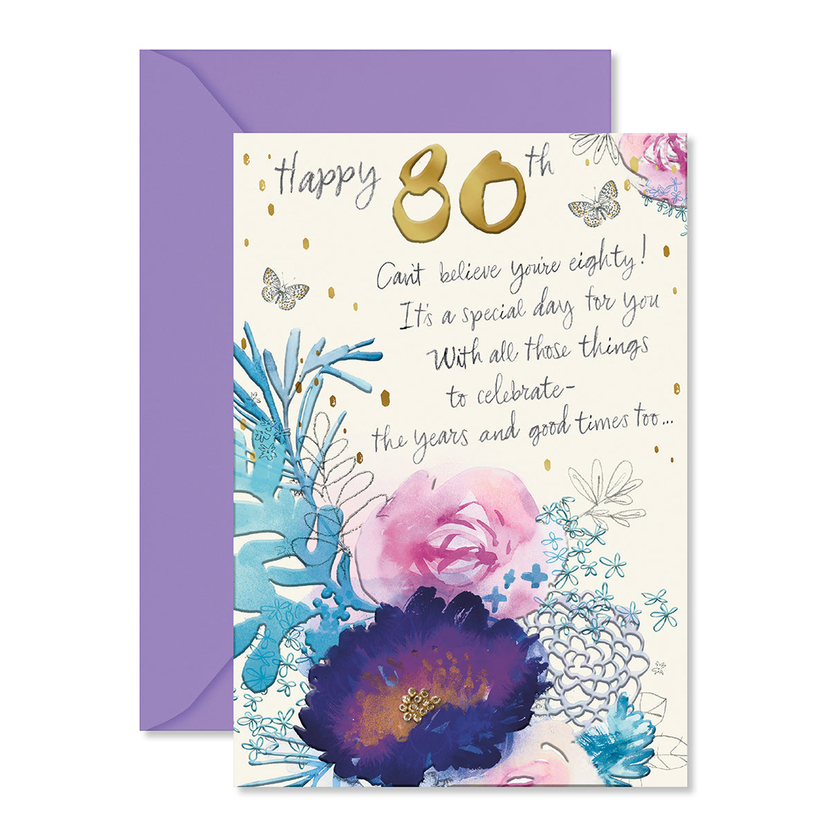 An 80th birthday greeting card with a lavender envelope behind it. The card has a cream background with gold foil '80th' text, blue and pink watercolor flowers, butterflies, and a handwritten celebratory message.