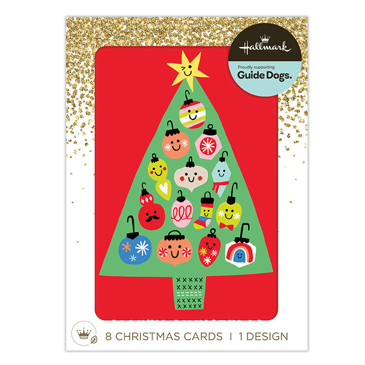 Hallmark Christmas cards featuring a colorful, playful Christmas tree with smiling guide dog ornaments, shown on a white background with gold glitter accents.
