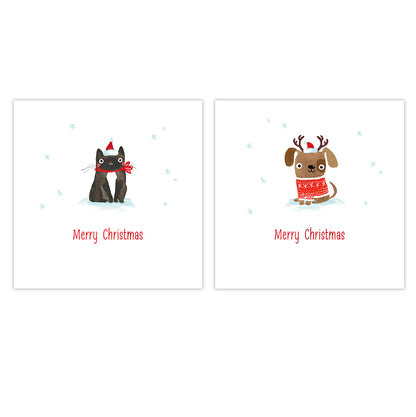 Two square Christmas greeting cards on a white background. The left card shows a black cat wearing a red Santa hat and scarf in the snow, with 'Merry Christmas' in red text below.