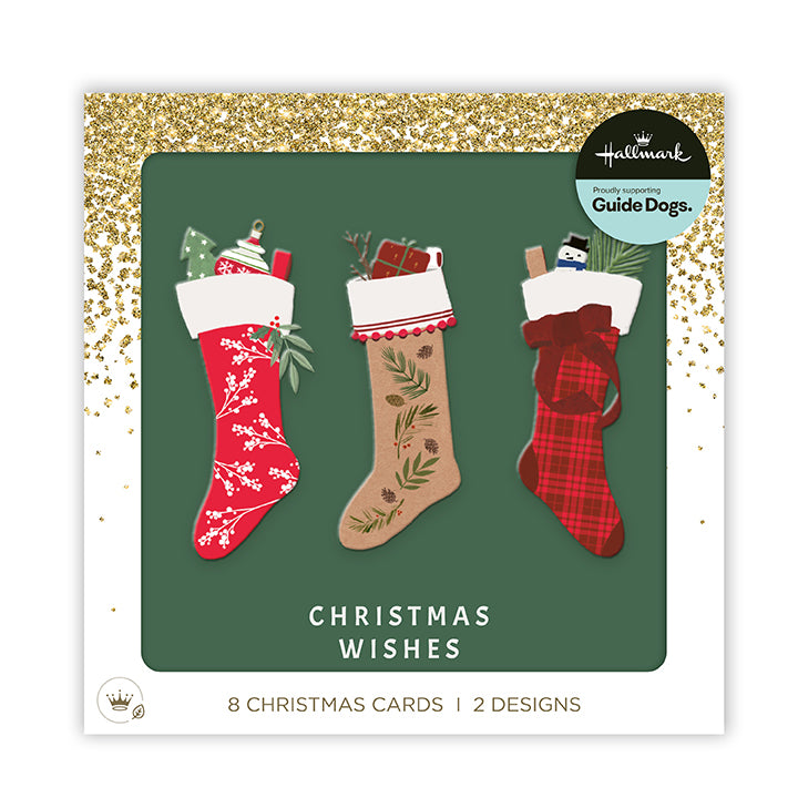 Hallmark Christmas Wishes card set featuring three illustrated Christmas stockings in red, beige, and plaid designs on a dark green background with gold glitter accents.
