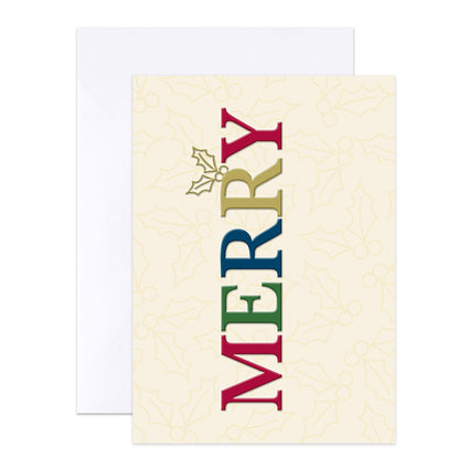 A festive holiday greeting card with the word 'MERRY' printed vertically in red, green, blue, and gold, with a small holly sprig above the letters. The card has a cream background with a subtle light gold holly pattern, shown with a plain white envelope behind it on a white background.