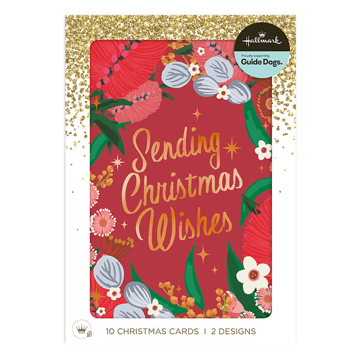 Hallmark 'With Guide Dogs' Christmas cards featuring a festive red background with gold glitter border, floral illustrations, and the text 'Sending Christmas Wishes'.