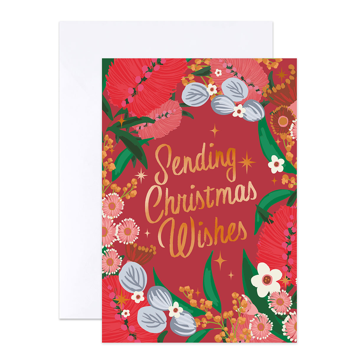 A Christmas greeting card with a red background and floral border, featuring the words 'Sending Christmas Wishes' in gold script, shown with a white envelope behind it.