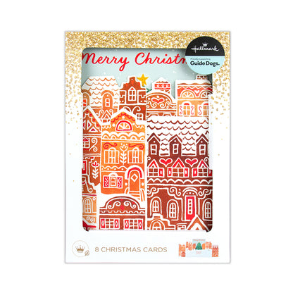 Hallmark Guide Dogs Christmas cards set in a white window box package with a gold glitter border and an illustration of gingerbread houses. The package contains 8 Christmas cards.