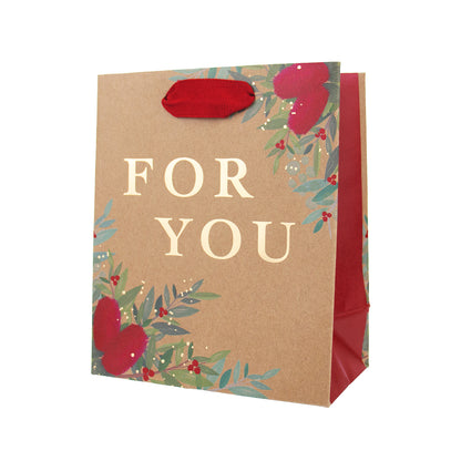 A brown kraft paper gift bag with red handles and a red interior, decorated with green leaves, red hearts, and the words 'FOR YOU' in beige lettering, shown on a plain white background.