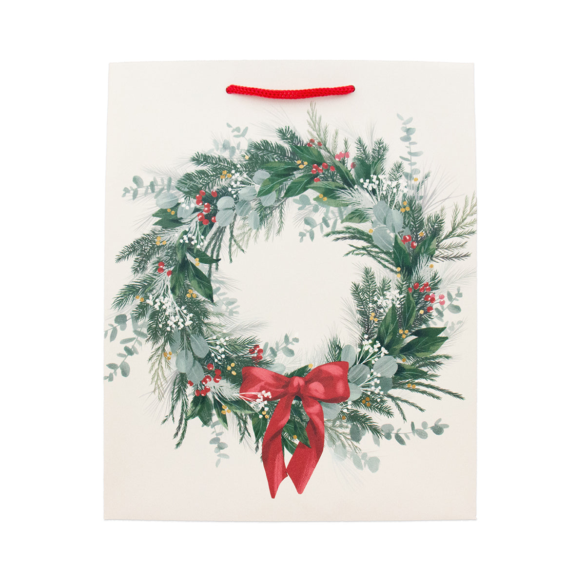 An off-white paper gift bag featuring a watercolor-style Christmas wreath design with green foliage, red berries, and a red bow, complete with a red hanging loop at the top.