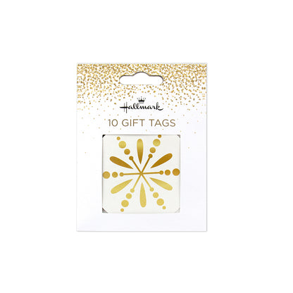 Pack of 10 Hallmark gift tags in a white card package with gold glitter accents and a clear window showing the gold tag design.