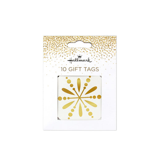 Pack of 10 Hallmark gift tags in a white card package with gold glitter accents and a clear window showing the gold tag design.