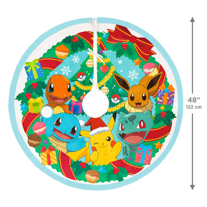 Pokémon Holiday, Fabric — 2026 Hallmark Keepsake 48" Christmas tree skirt featuring a festive wreath design with Pikachu and friends in vibrant colours.
