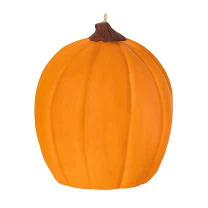 Happy Halloween! — 2026 Hallmark Keepsake Halloween Ornament, orange jack-o'-lantern design with a brown stem, flat view.