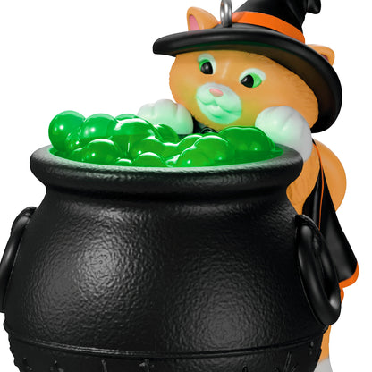 Mischievous Kittens Orange Cat Energy Special Edition — 2026 Hallmark Keepsake Halloween Ornament with green bubbles in cauldron