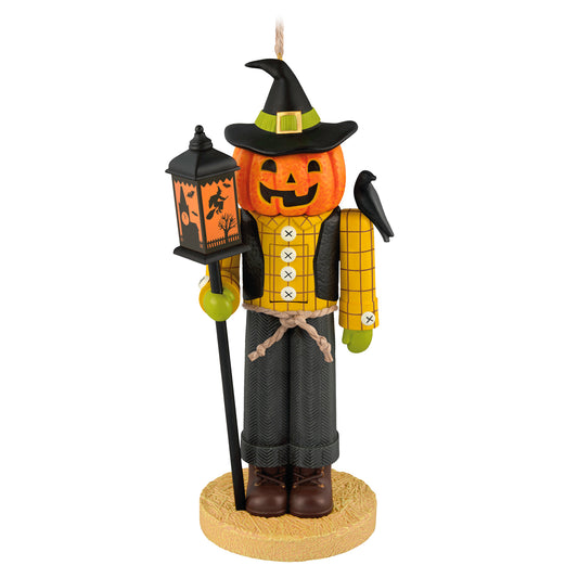 Halloween Noble Nutcracker Sir Gourdon Fields — 2026 Hallmark Keepsake Halloween Ornament, scarecrow with jack-o'-lantern head, holding lantern.