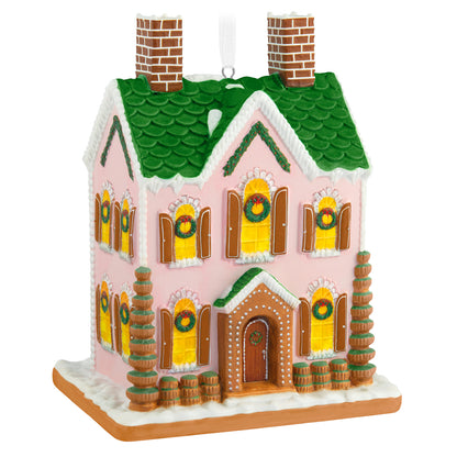 Gorgeous Gingerbread House, Porcelain — 2026 Hallmark Keepsake Christmas Ornament in pink with green accents, displaying wreaths and snow details.