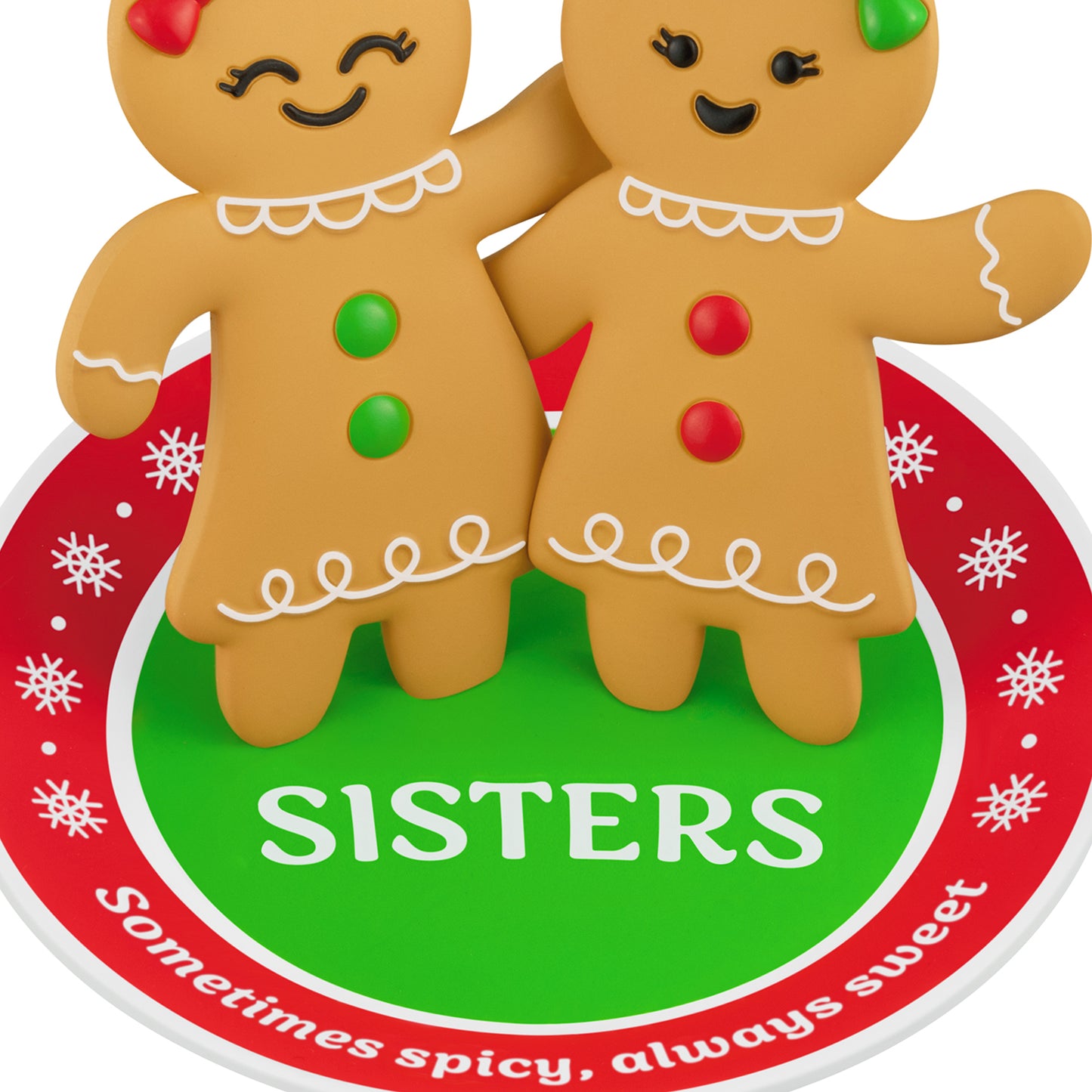 Sweet and Spicy Sisters — 2026 Hallmark Keepsake Christmas Ornament featuring whimsical gingerbread girls with buttons standing on a festive rug.