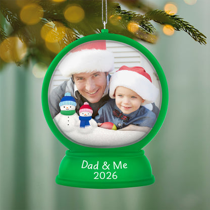 Dad and Me Snow Globe 2026 Photo Frame — 2026 Hallmark Keepsake Christmas Ornament featuring snow people and space for a cherished photo.
