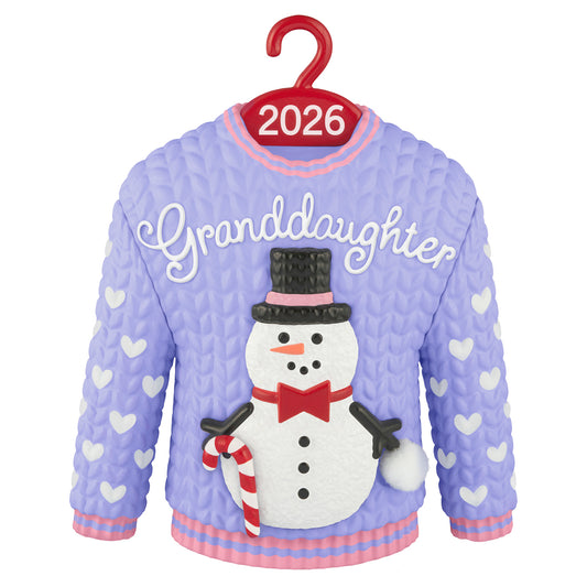 Granddaughter Snowman Sweater 2026 — 2026 Hallmark Keepsake Christmas Ornament, purple with snowman detail, hanging display.