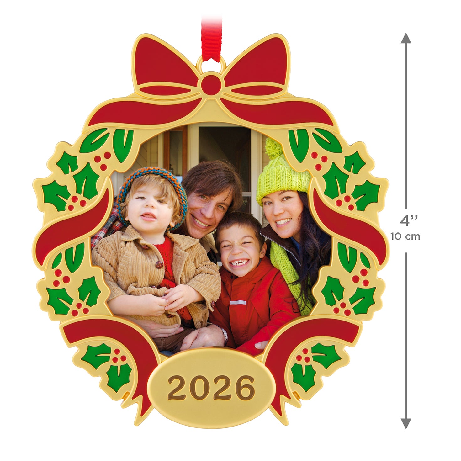 Our Family Christmas 2026 photo frame, metal, features a gold wreath design with holly, showcasing a family photo.