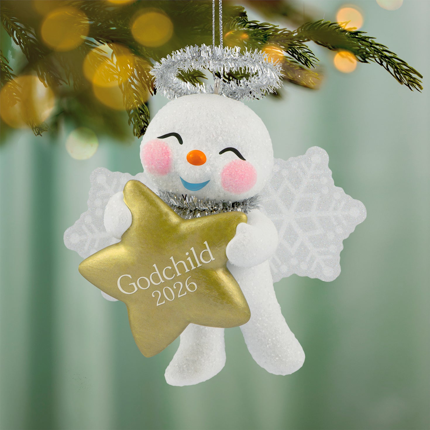 Godchild Snow Angel 2026 — 2026 Hallmark Keepsake Christmas Ornament with snowflake wings, smiling face, and golden star detail.