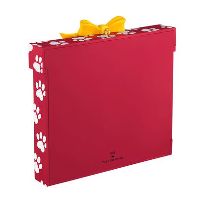 My Fur-st Christmas 2026 Photo Frame — 2026 Hallmark Keepsake Christmas Ornament in red with paw print design and yellow bow, flat lay
