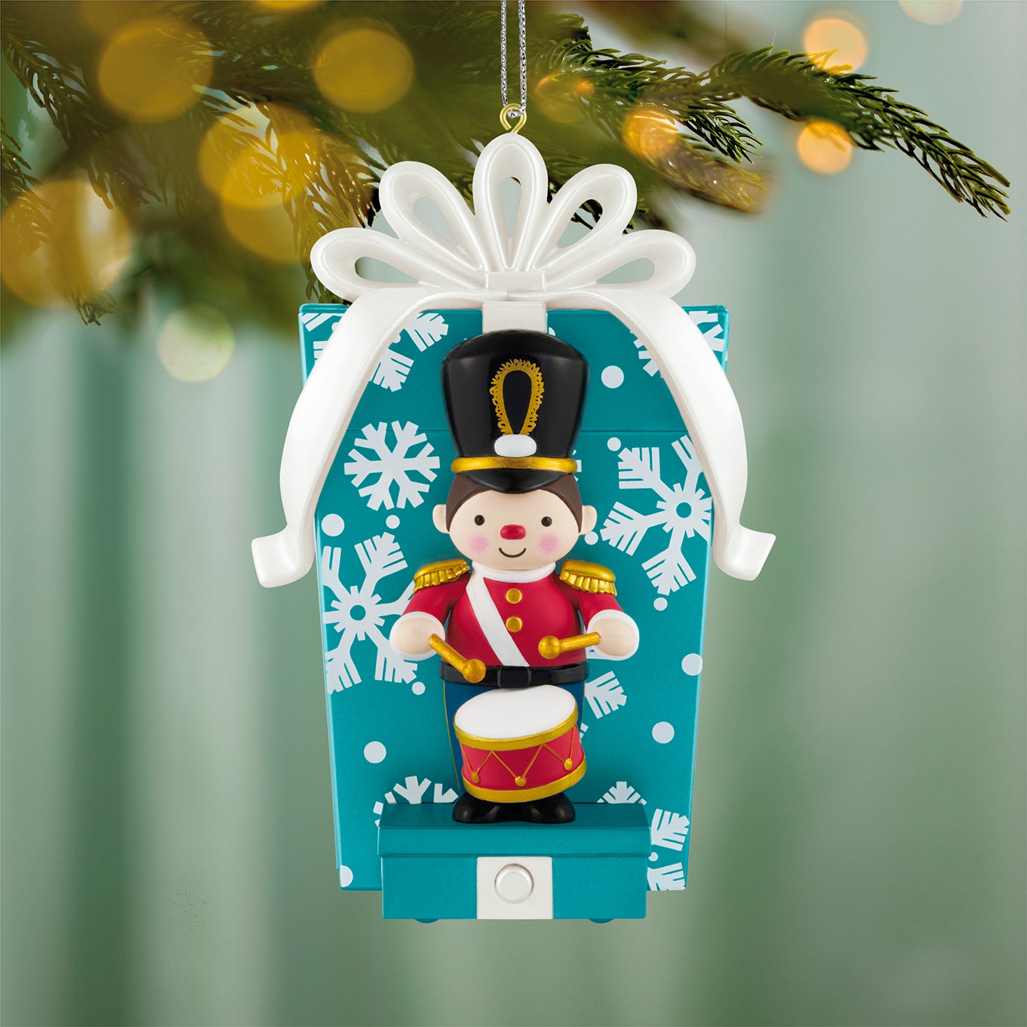 Toy Soldier Musical With Motion — 2026 Hallmark Keepsake Christmas Ornament, festive design with a toy soldier in front of a gift box.