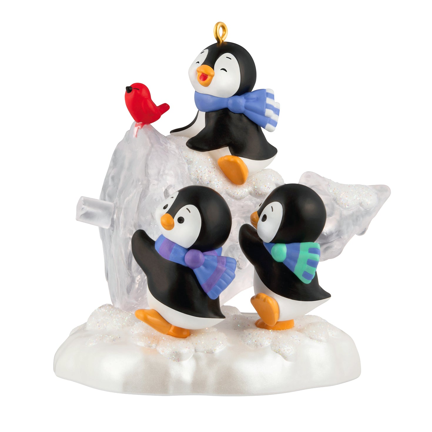 The Perfect Tree — 2026 Hallmark Keepsake Christmas Ornament featuring playful penguins with scarves carrying a snowy treasure, close up view.