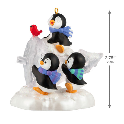 The Perfect Tree — 2026 Hallmark Keepsake Christmas Ornament with playful penguins and a red bird on a snowy base, 7 cm tall.