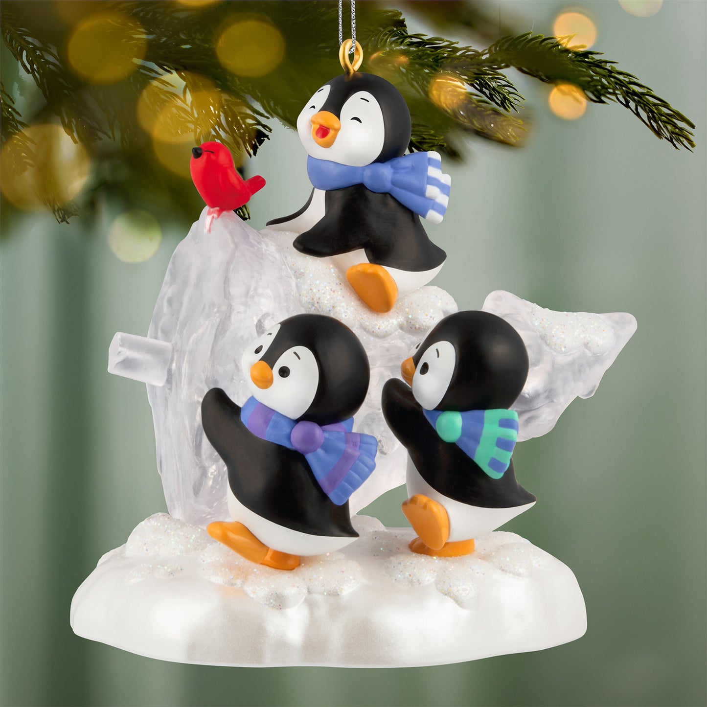 The Perfect Tree — 2026 Hallmark Keepsake Christmas Ornament featuring playful penguins in scarves and a red bird on snow-covered ornament.