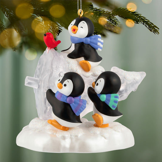 The Perfect Tree — 2026 Hallmark Keepsake Christmas Ornament featuring playful penguins in scarves and a red bird on snow-covered ornament.