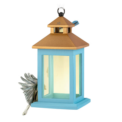 Marjolein Bastin Feathered Friends — 2026 Hallmark Keepsake Christmas Ornament featuring a blue lantern with a detailed bird design, angled view.