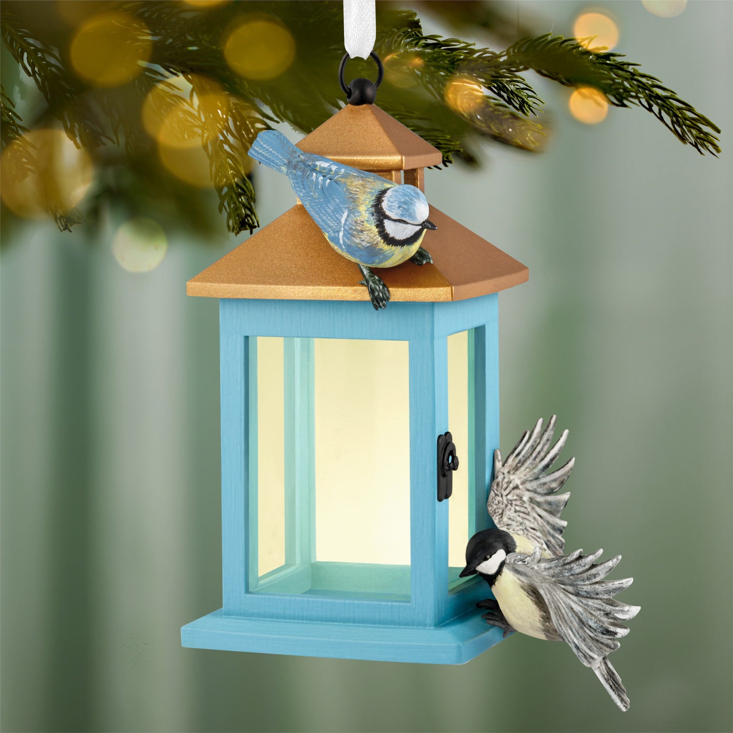 Marjolein Bastin Feathered Friends — 2026 Hallmark Keepsake Christmas Ornament featuring a blue lantern with two birds perched, close up view