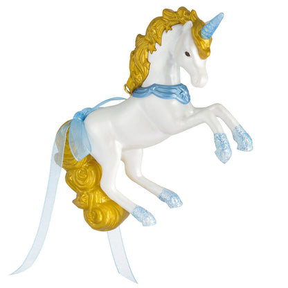 Celestial Unicorn — 2026 Hallmark Keepsake Christmas Ornament, white unicorn with gold mane, blue ribbon and glittery hooves, angled view.