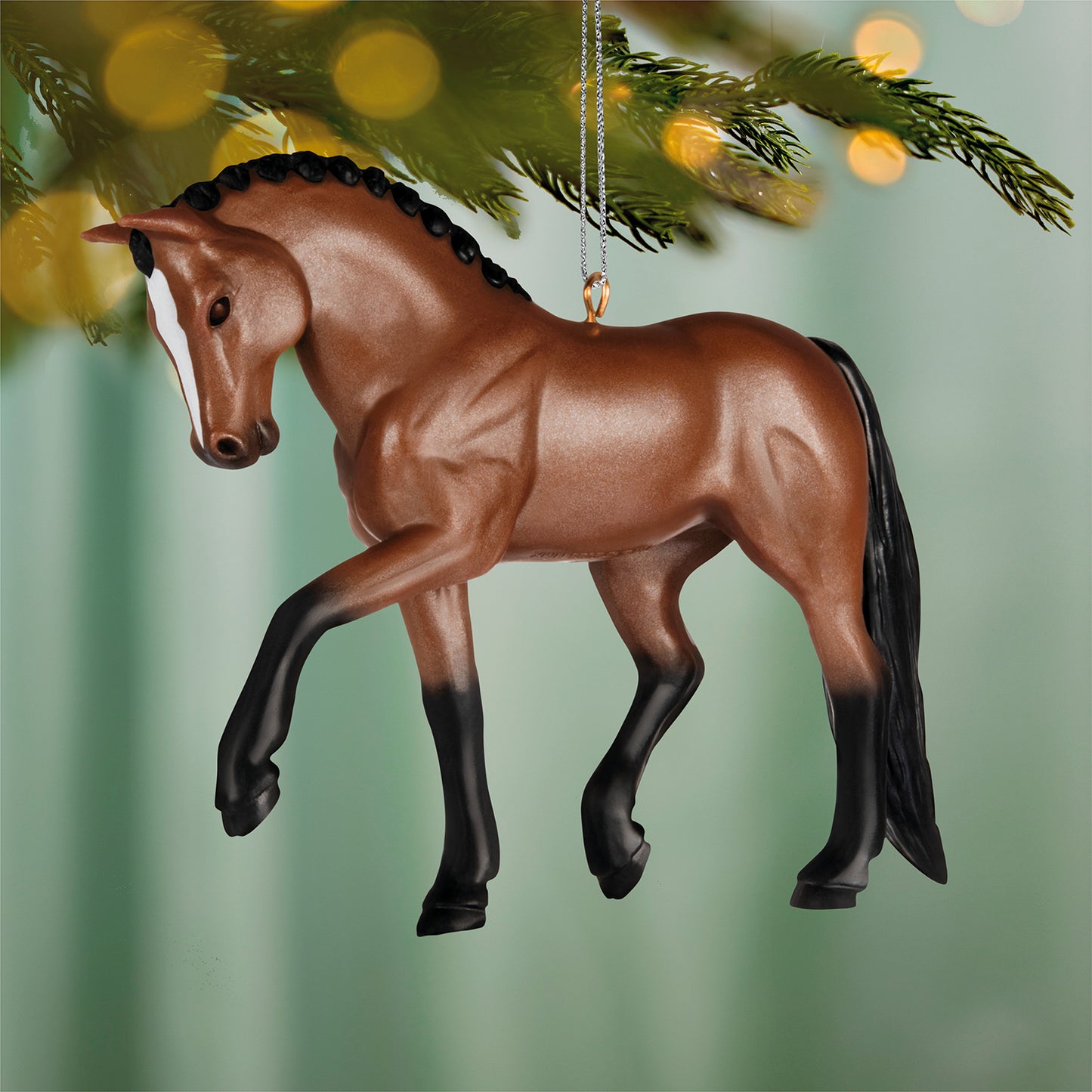 Warmblood Dream Horse — 2026 Hallmark Keepsake Christmas Ornament, light bay colour, featuring braided mane, hanging from a tree