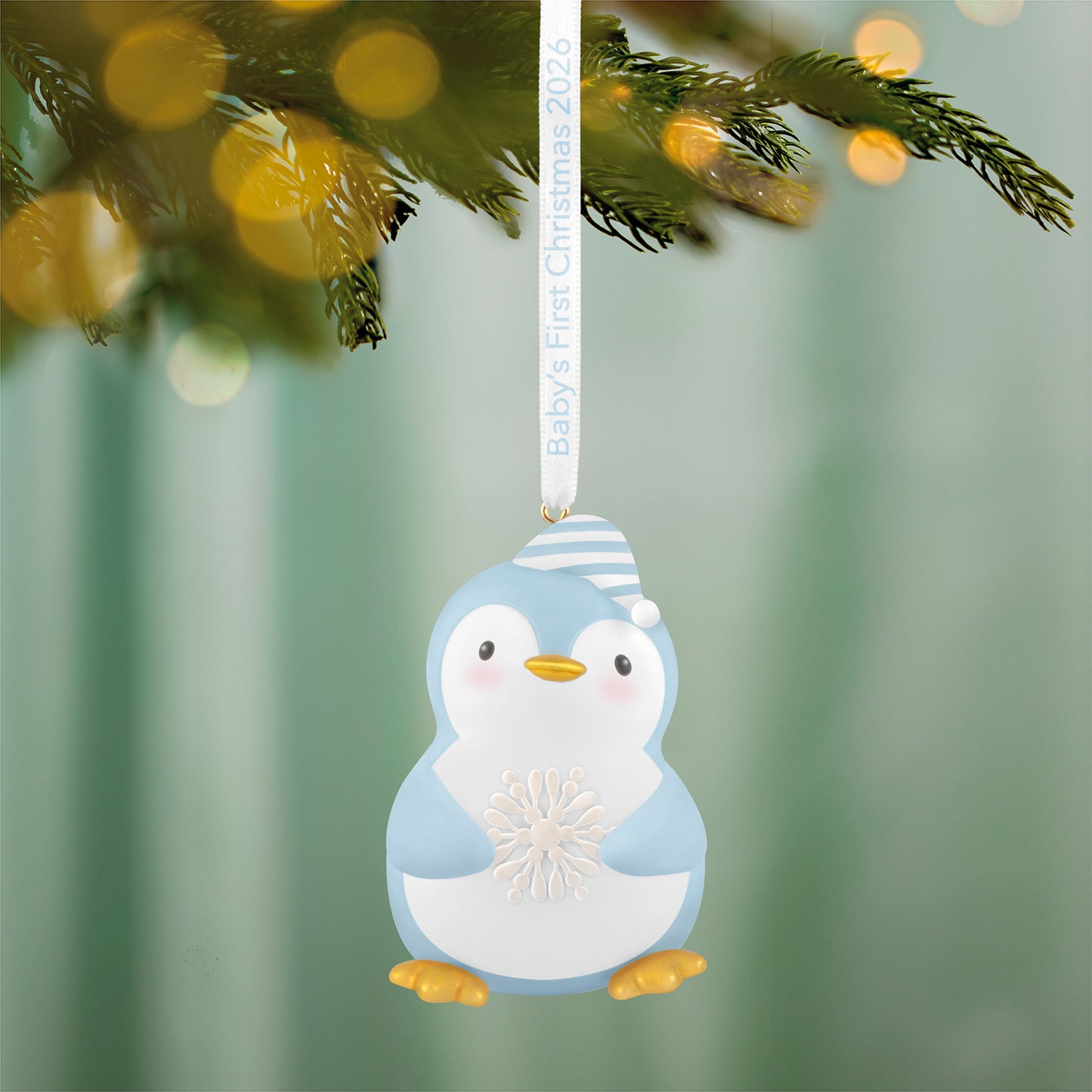 Baby Boy's First Christmas Penguin 2026 — 2026 Hallmark Keepsake Christmas Ornament, blue penguin design, detailed snowflake, hanging on tree.