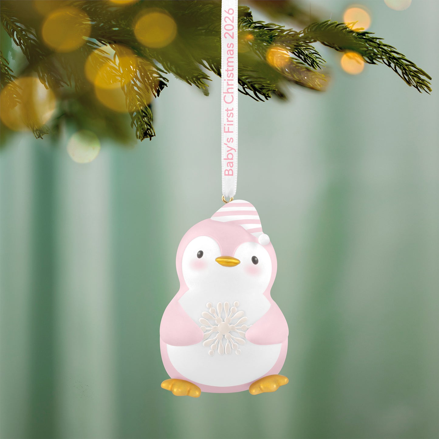 Baby girl's first Christmas Penguin 2026 — 2026 Hallmark Keepsake Christmas Ornament, pink and white with a snowflake detail.