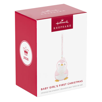 Baby girl's first Christmas Penguin 2026 — 2026 Hallmark Keepsake Christmas Ornament in packaging with pink and white design.