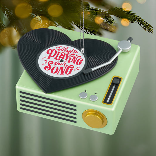 They're Playing Our Song — 2026 Hallmark Keepsake Christmas Ornament, mint green record player with heart-shaped vinyl, hanging on a Christmas tree.