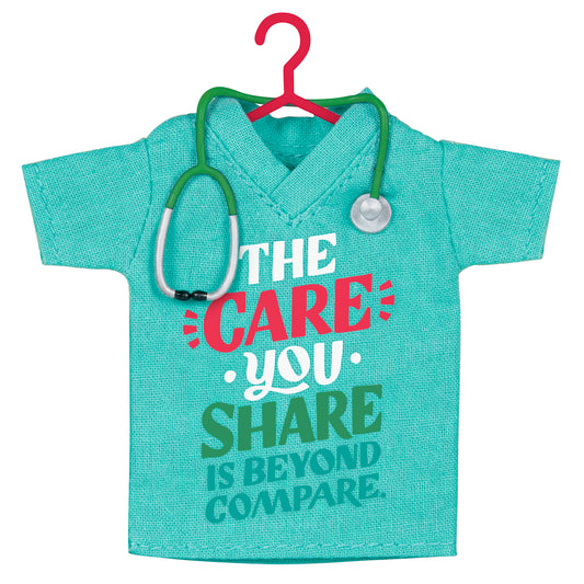 The Care You Share, Fabric — 2026 Hallmark Keepsake Christmas Ornament, teal fabric scrubs shirt with stethoscope detail, front view