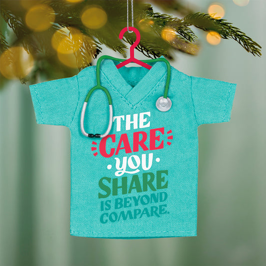 The Care You Share, Fabric — 2026 Hallmark Keepsake Christmas Ornament in teal fabric, featuring a stethoscope and gratitude message, close up view.