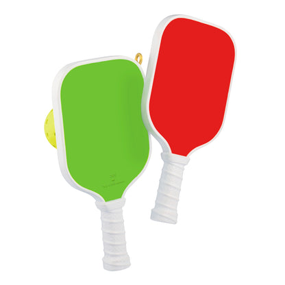 Merry Pickleball — 2026 Hallmark Keepsake Christmas Ornament featuring green and red pickleball paddles with a yellow ball in close-up view.