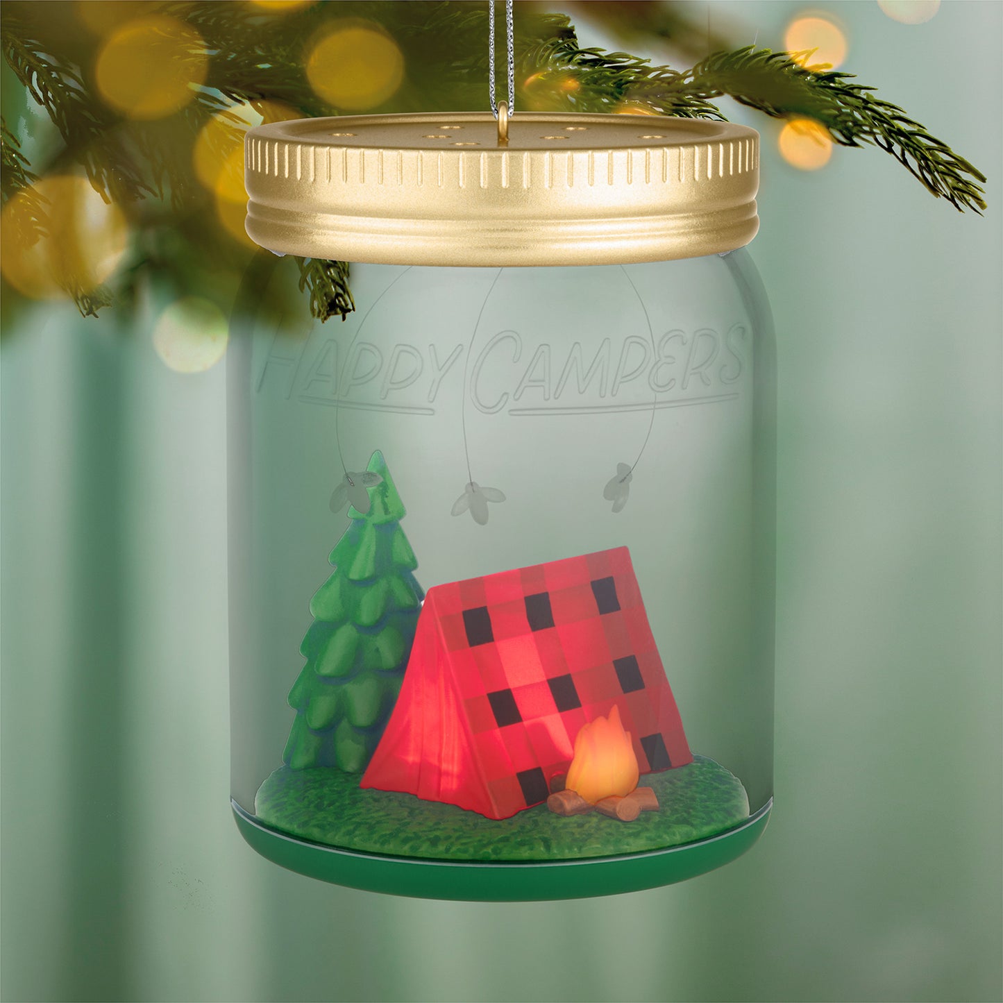 Happy Campers — 2026 Hallmark Keepsake Christmas Ornament in a Mason jar with a camping scene, lit up, and embellished with fireflies.
